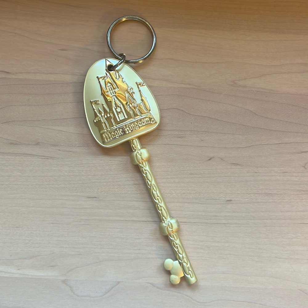 Disney gold Magic Kingdom key fob